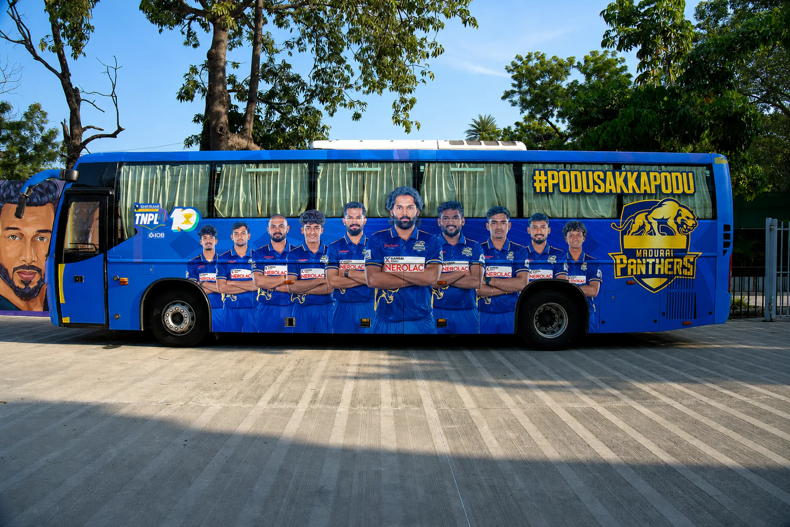 Opposite-side view of the Madurai Panthers team bus