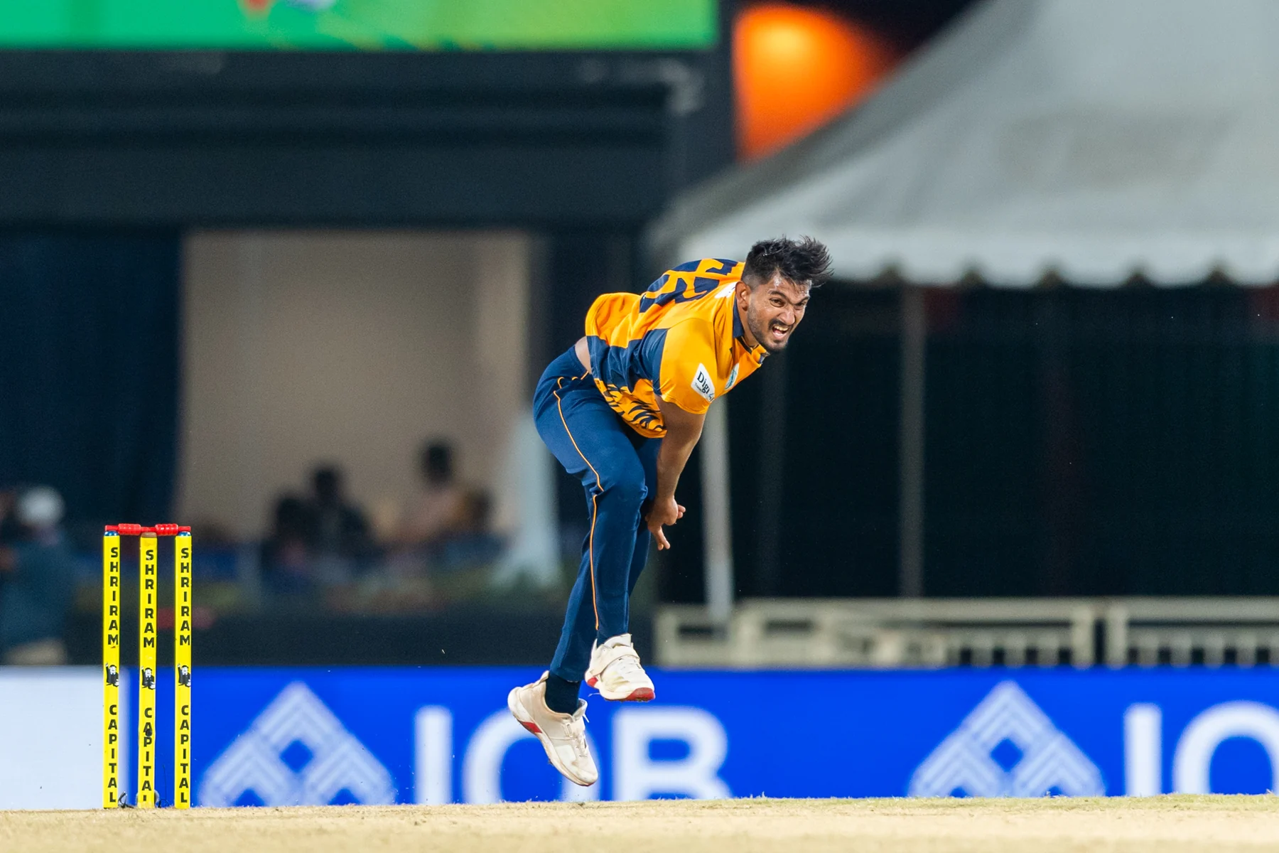 Nellai Royal Kings bowler in action against Madurai Panthers