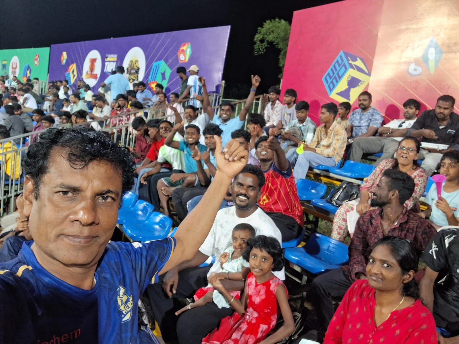 Supporters enjoying the stadium atmosphere at Natham