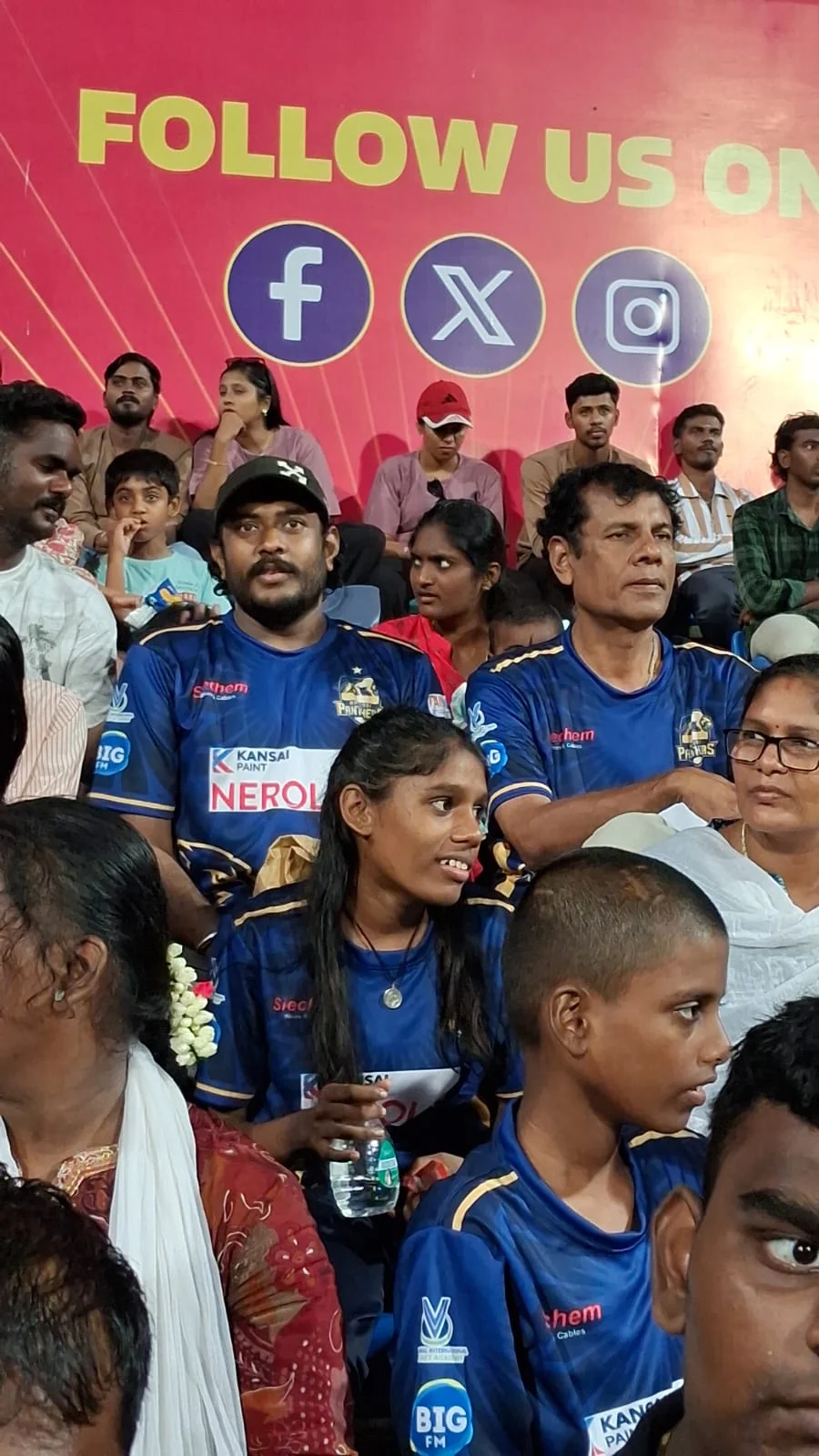 Young guests watching the match in Madurai Panthers jerseys